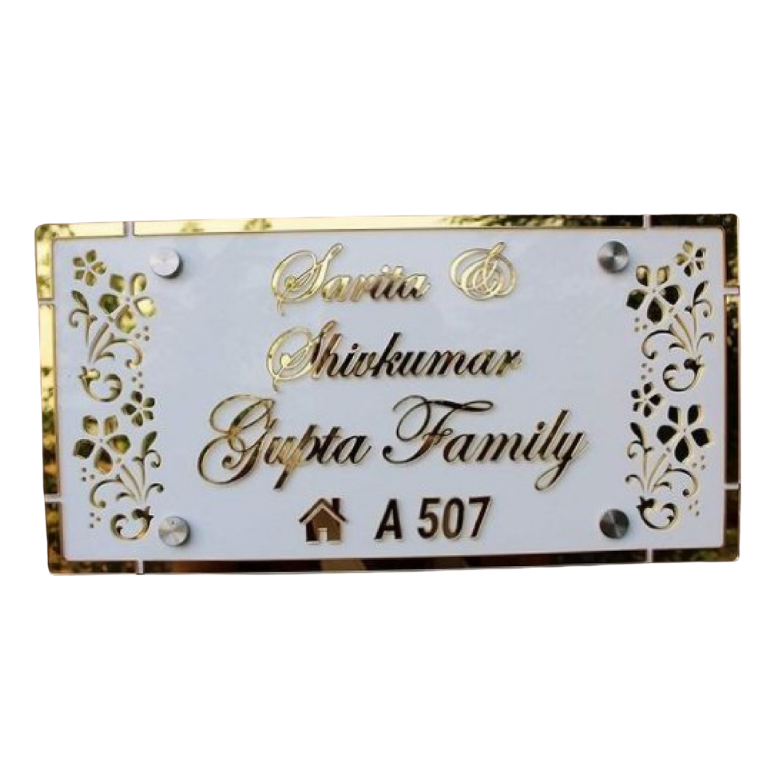 White and gold acrylic name plate displaying Gupta Family, Shrikumar, and house number A 507