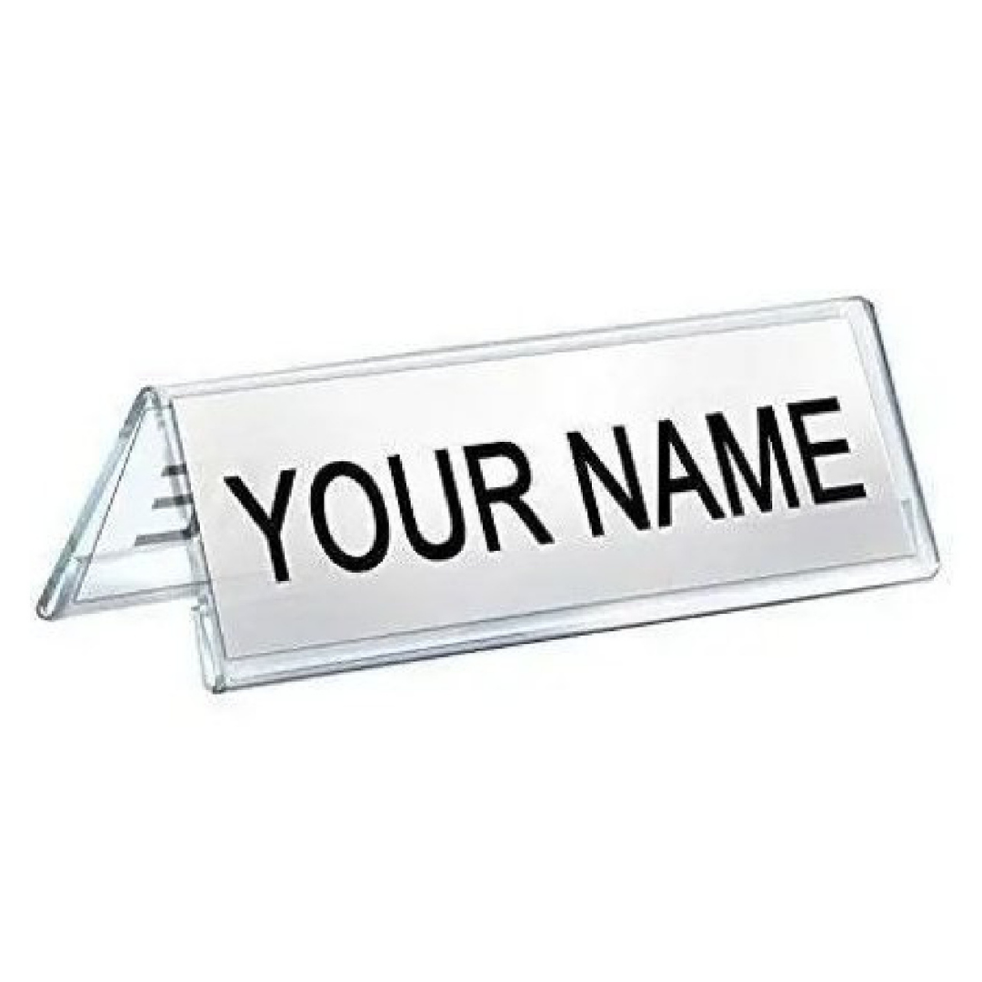 Clear triangular acrylic desk name plate displaying “YOUR NAME” in bold black lettering
