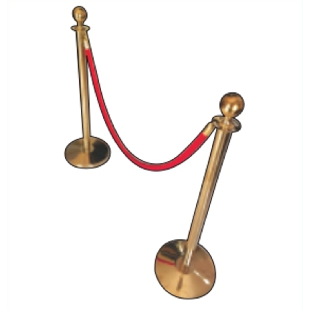 Gold crowd control stanchions with red velvet rope for event and entrance barriers