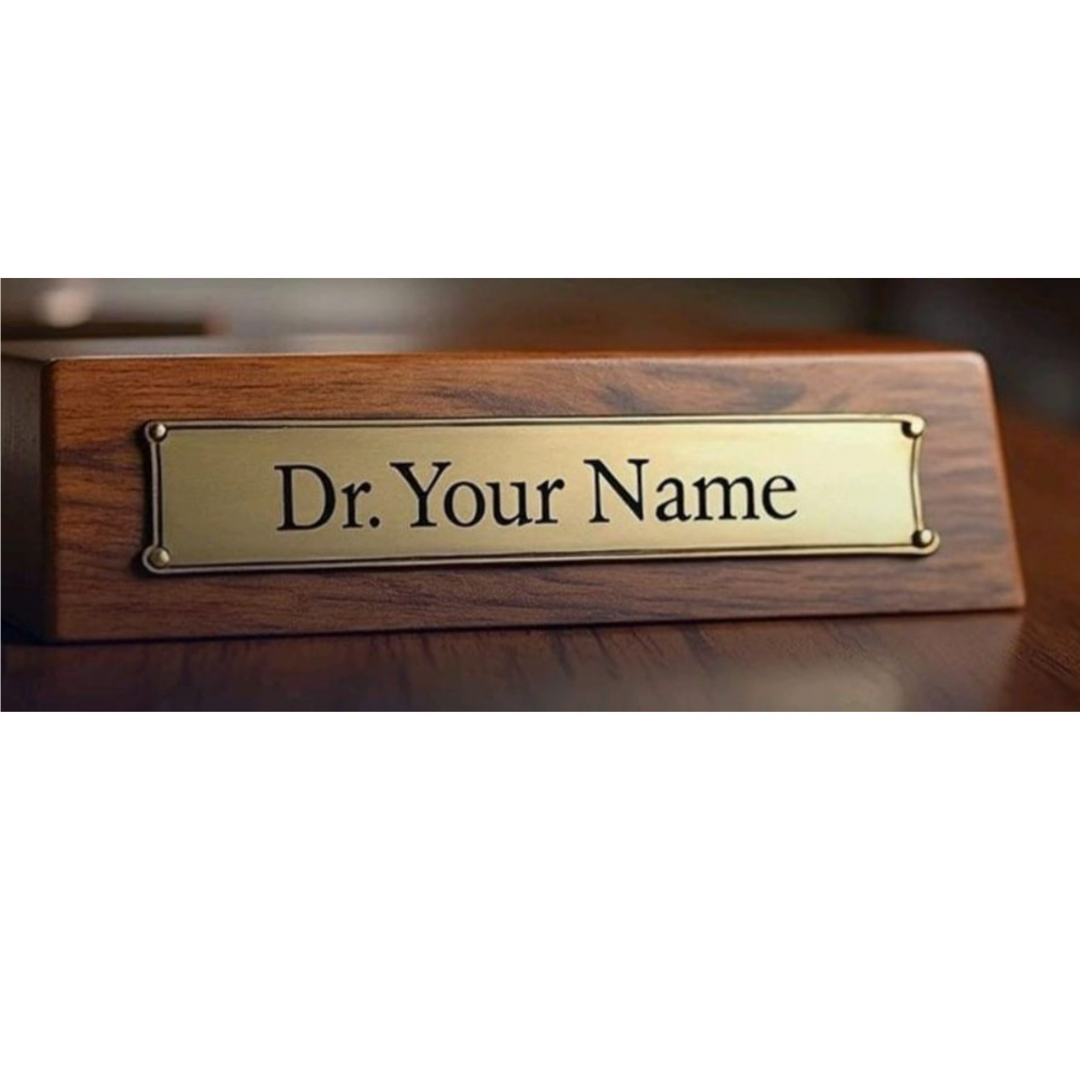 Wooden desk name plate with a brass-colored inset plaque reading “Dr. Your Name.”
