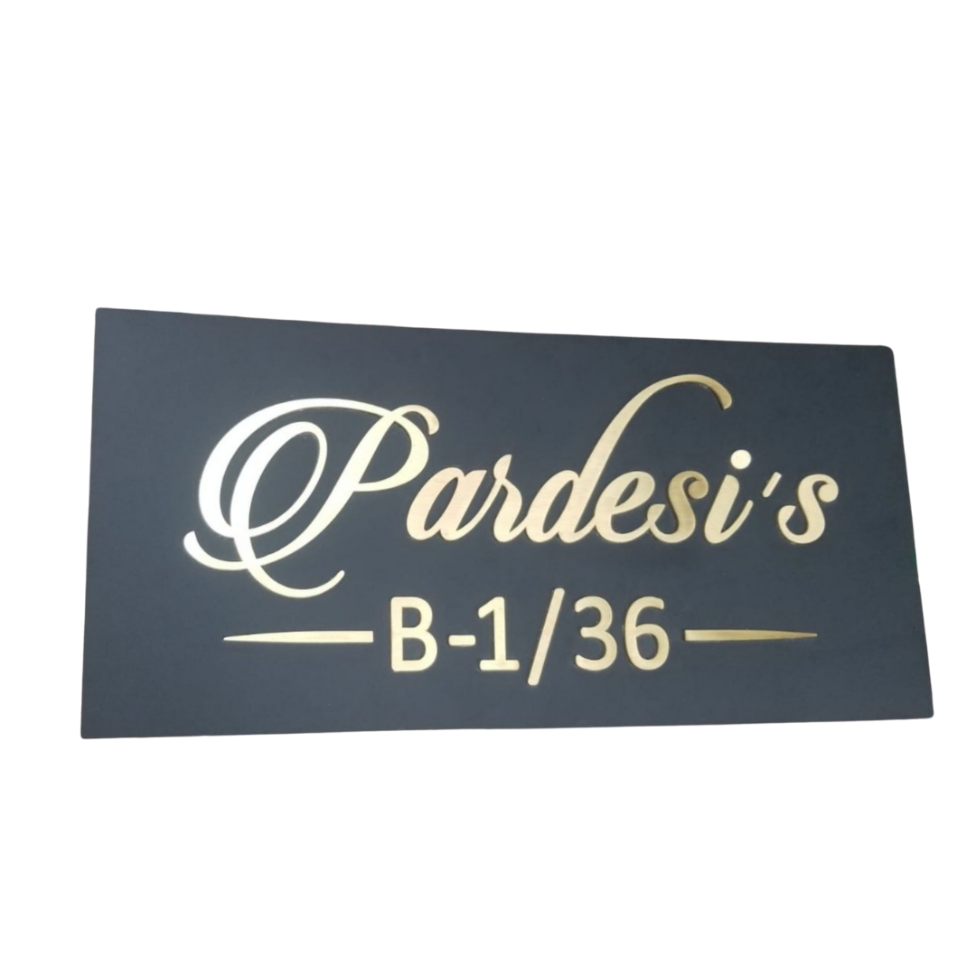 Black rectangular name plate with gold cursive lettering reading “Pardesi’s” and the address “B-1/36” below.