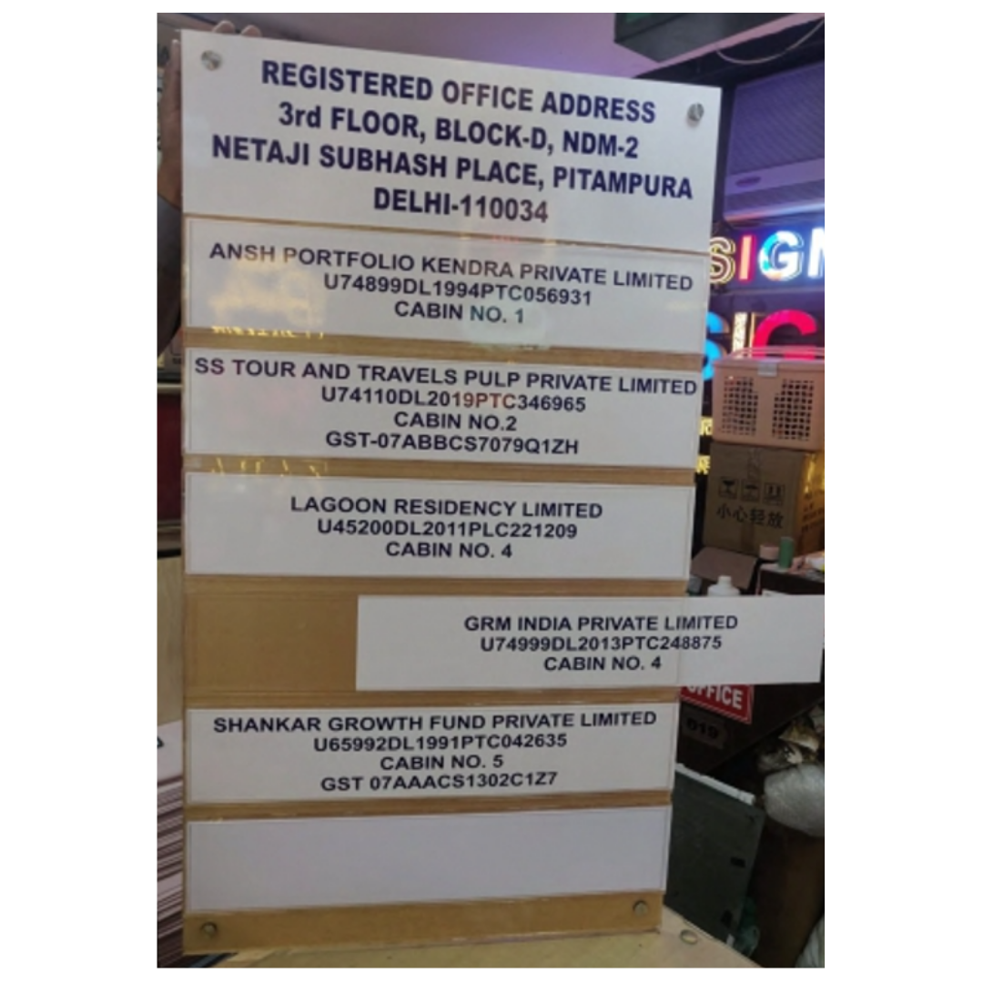 Premium multi-panel manufacturing signage board displaying company names, registered office details, cabin numbers, and corporate identification information.