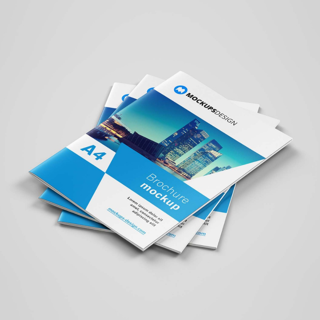 Stack of blue and white A4 brochure mockups featuring a cityscape cover