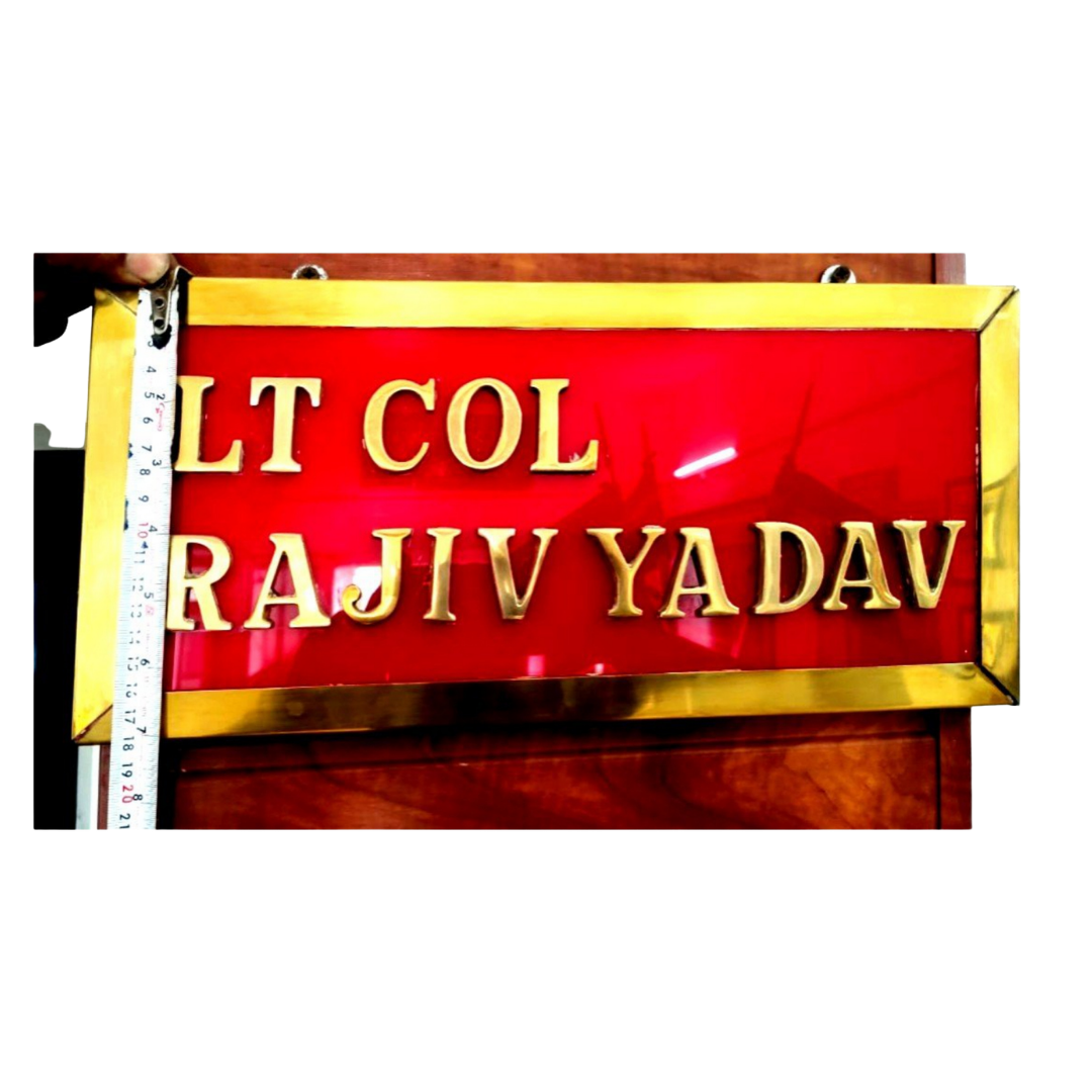 Red and gold customized military name plate displaying Lt Col Rajiv Yadav