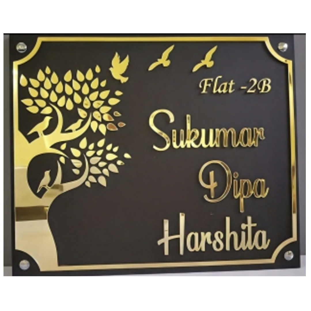 Premium black-and-gold nameplate for Flat 2B, featuring a decorative tree of life, flying birds, and the names Sukumar, Dipa, and Harshita.