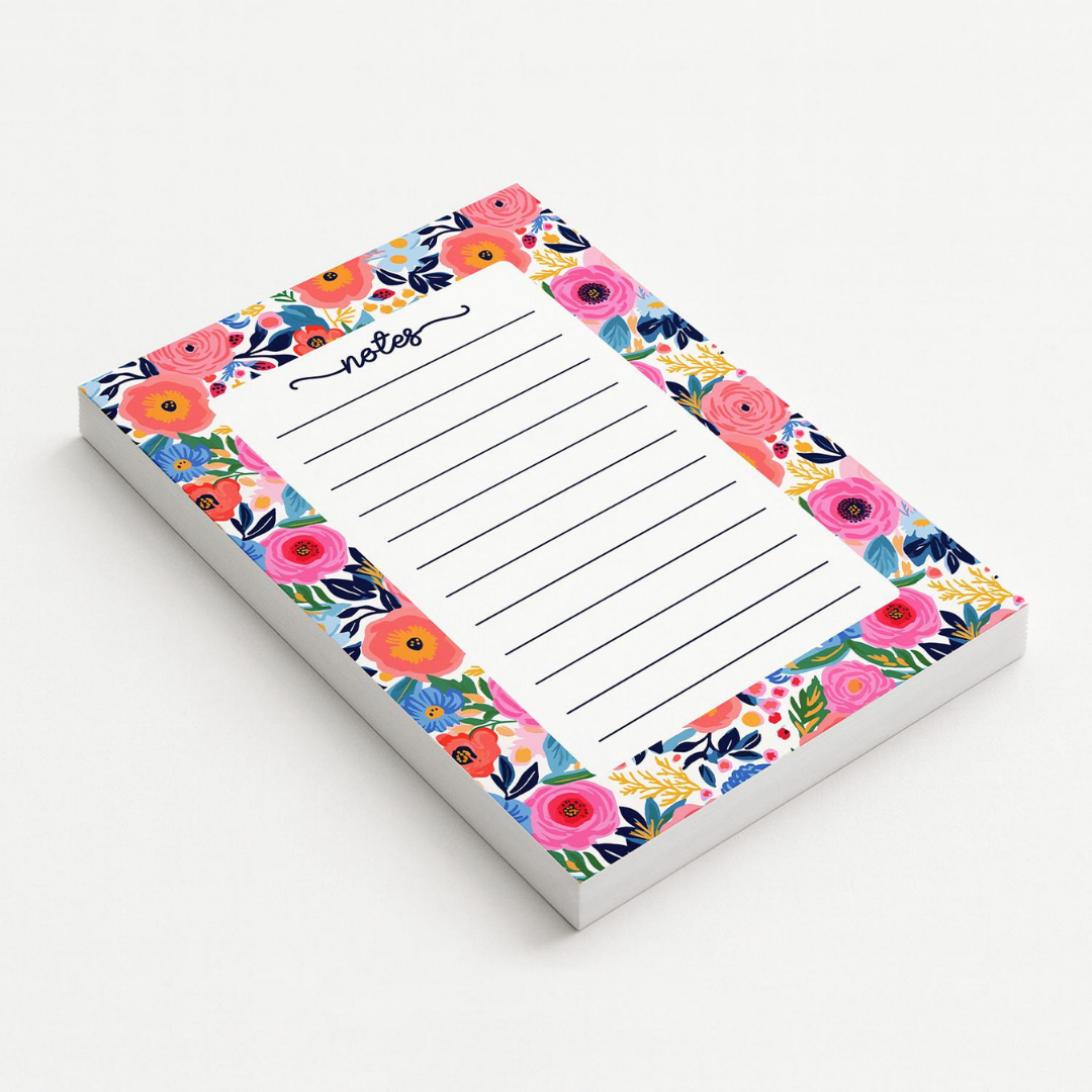 Floral notepad with lined writing area on a white background