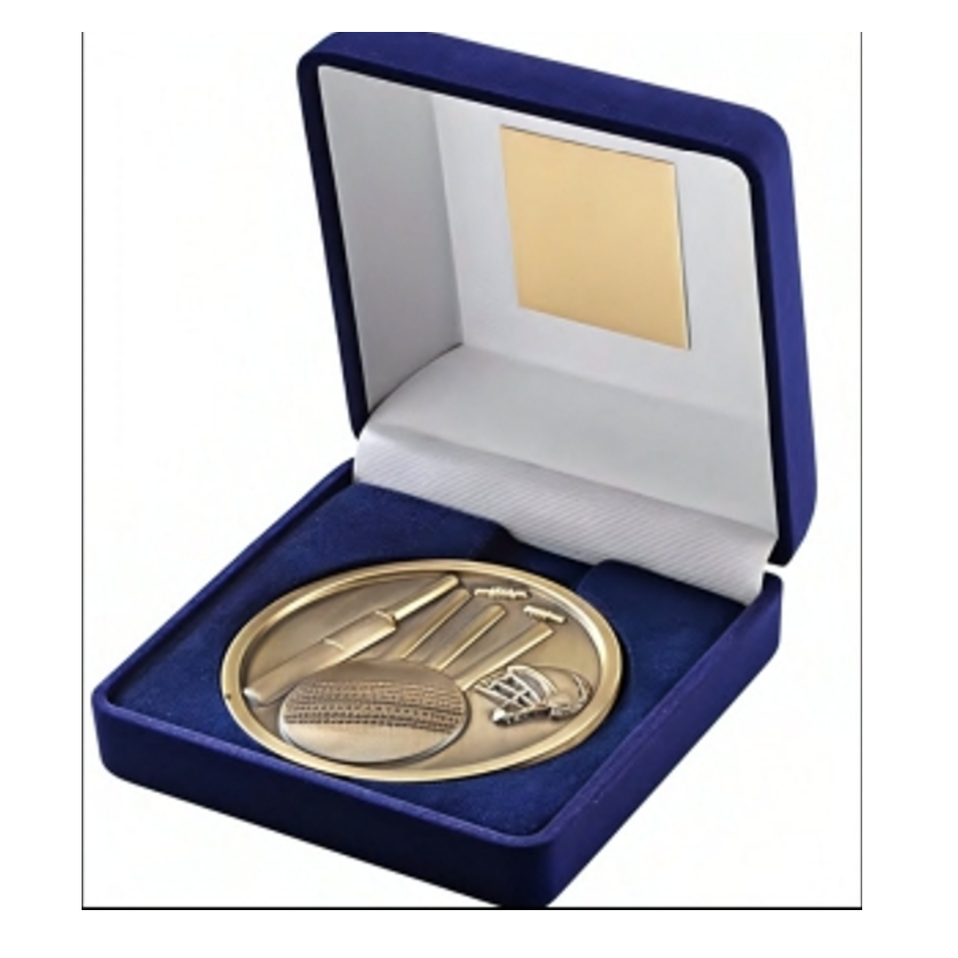 Gold-tone commemorative medal displayed in a blue velvet presentation box