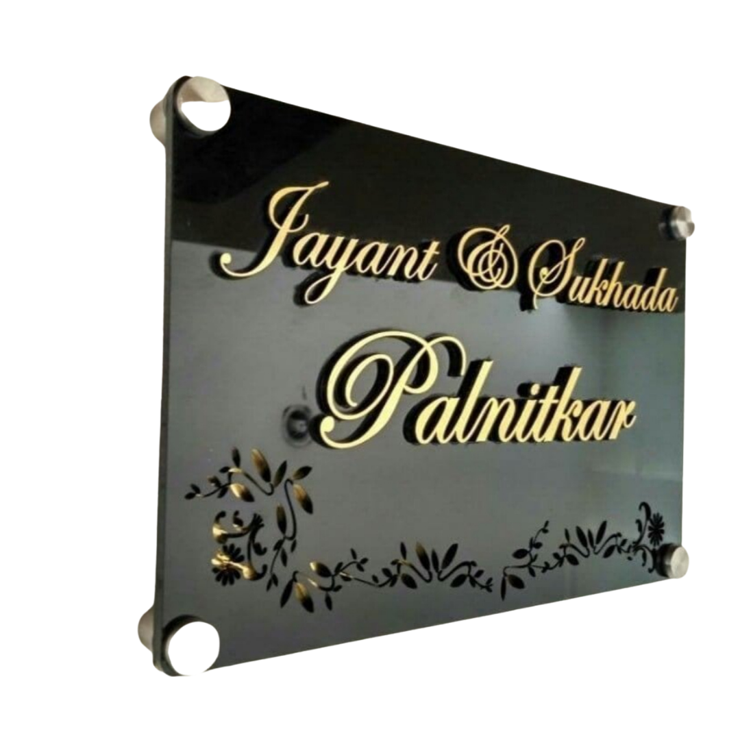 Black acrylic family name plate displaying Jayant and Sukhada Palnitkar in gold lettering