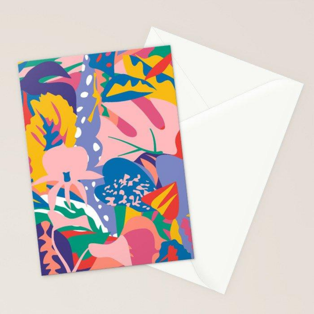 Colorful abstract greeting card with vibrant floral design and white envelope