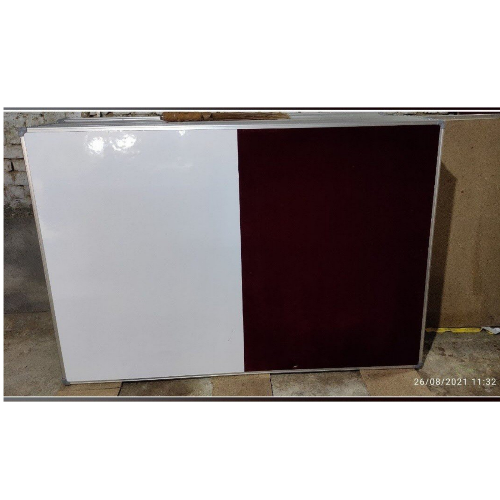Combination display board featuring a white dry-erase writing surface and burgundy felt notice board in a silver metal frame.
