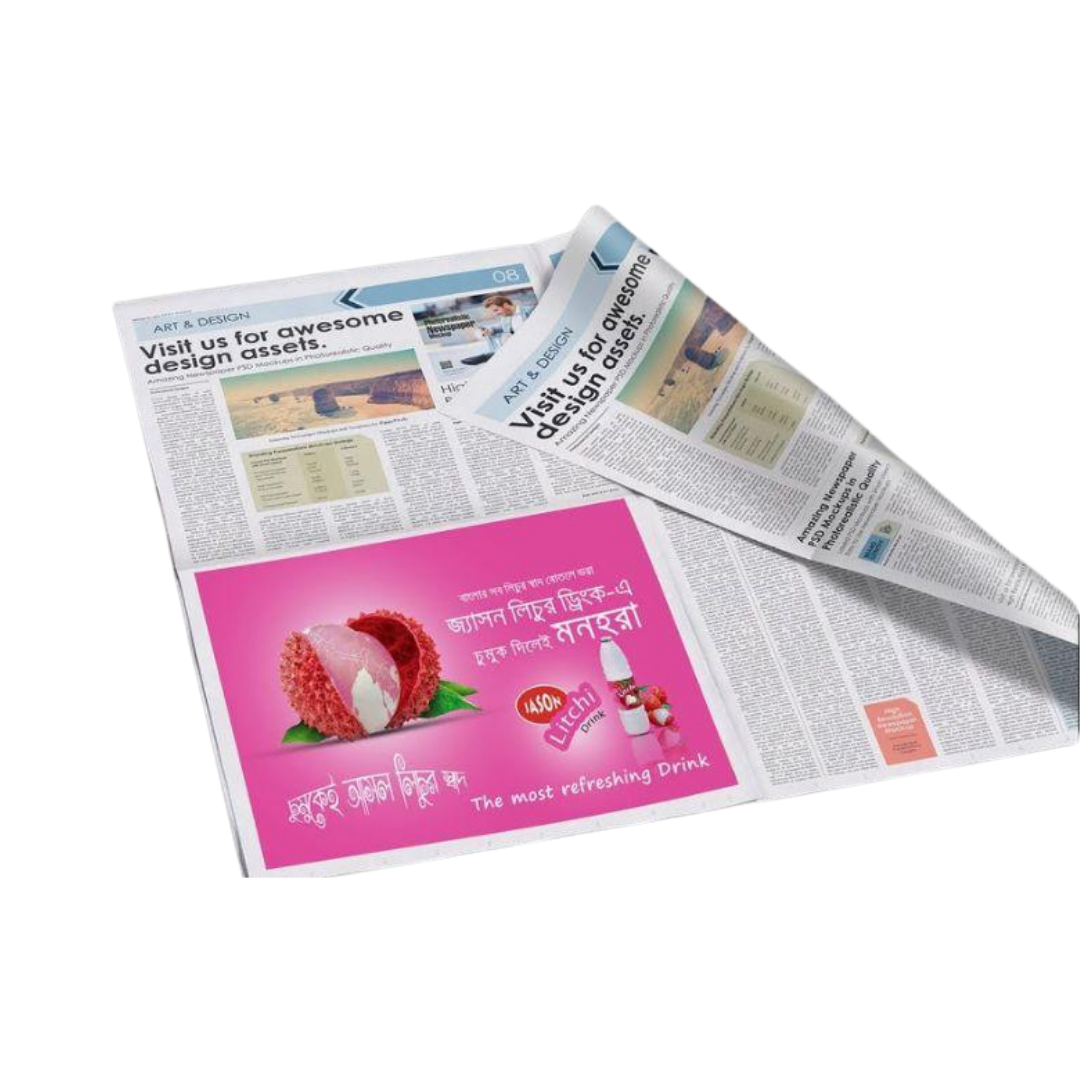 Open newspaper featuring design assets, articles, photos, and a pink beverage advertisement