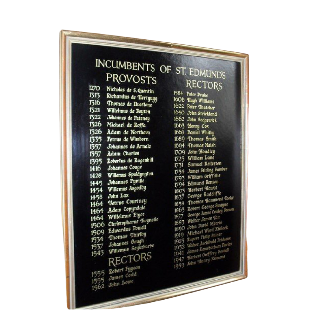 Framed black commemorative plaque listing the historic Provosts and Rectors of St. Edmund’s with names and years